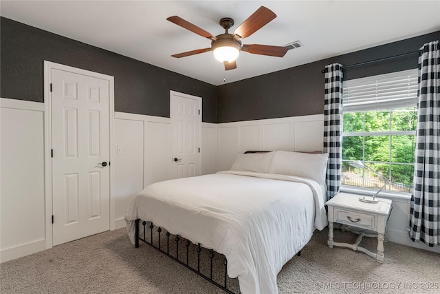 12511 S 18th Cir E, Jenks, OK 74037 - carpeted bedroom with ceiling fan, wainscoting, and a closet