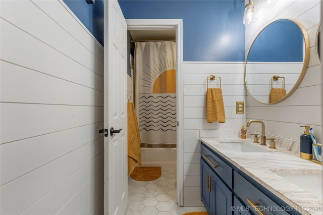 12511 S 18th Cir E, Jenks, OK 74037 - full bath with double vanity, tile patterned floors, and shower / bath combination with curtain