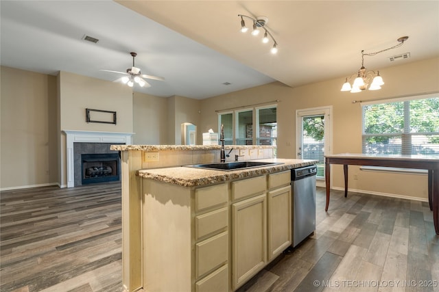 12522 S Cedar Ave, Jenks, OK 74037 - kitchen with dishwasher, wood finished floors, plenty of natural light, and a ceiling fan