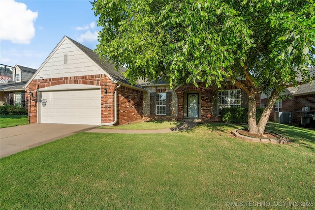 12522 S Cedar Ave, Jenks, OK 74037 - view of front of house featuring an attached garage, a front lawn, driveway, and brick siding