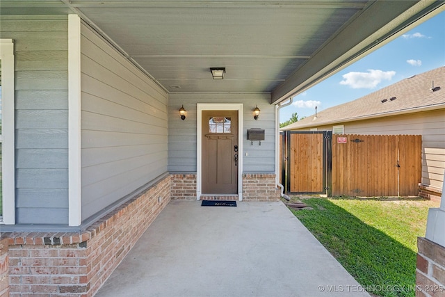 2610 E 5th Pl, Tulsa, OK 74104 - doorway to property with a gate