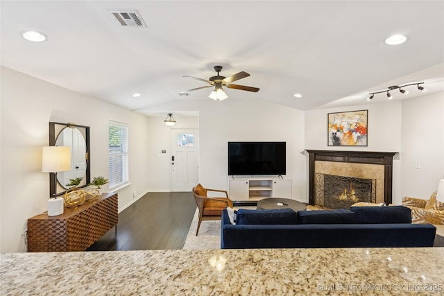 2610 E 5th Pl, Tulsa, OK 74104 - living area featuring wood finished floors, lofted ceiling, recessed lighting, a fireplace, and ceiling fan