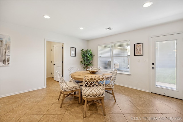 2610 E 5th Pl, Tulsa, OK 74104 - dining space featuring light tile patterned flooring and recessed lighting