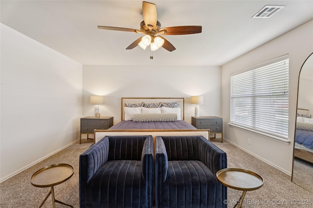 2610 E 5th Pl, Tulsa, OK 74104 - carpeted bedroom featuring baseboards and a ceiling fan