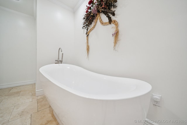 8120 E 112th St, Owasso, OK 74055 - bathroom with a soaking tub and ornamental molding