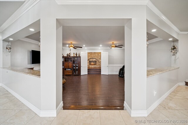 8120 E 112th St, Owasso, OK 74055 - corridor with crown molding, recessed lighting, and wood finished floors