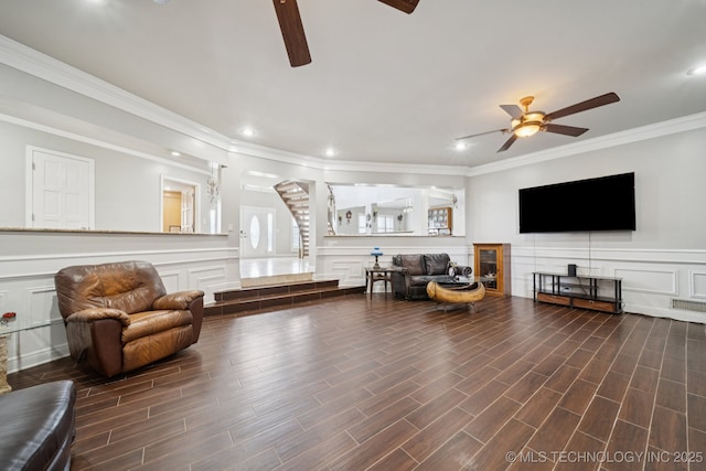 8120 E 112th St, Owasso, OK 74055 - living room with a ceiling fan, crown molding, a decorative wall, recessed lighting, and dark wood-style flooring