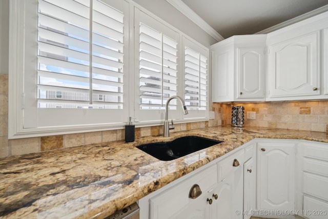 8120 E 112th St, Owasso, OK 74055 - kitchen featuring tasteful backsplash, white cabinets, light stone counters, and ornamental molding