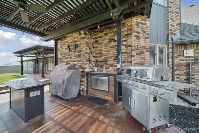 8120 E 112th St, Owasso, OK 74055 - view of patio with a pergola, an outdoor kitchen, and a ceiling fan