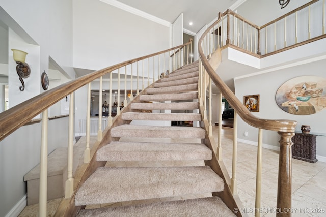 8120 E 112th St, Owasso, OK 74055 - stairway with a towering ceiling and crown molding