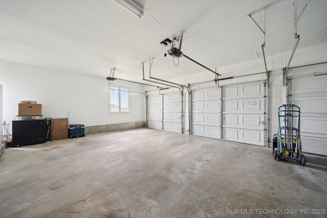 8120 E 112th St, Owasso, OK 74055 - garage featuring a garage door opener