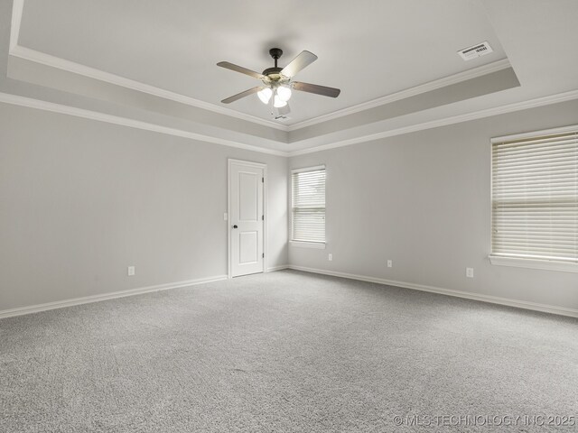 3712 W 107th Ct, Jenks, OK 74037 - empty room featuring a raised ceiling, a ceiling fan, crown molding, and carpet flooring