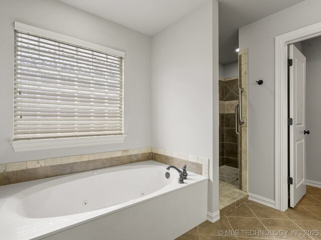 3712 W 107th Ct, Jenks, OK 74037 - bathroom with a tub with jets, a tile shower, and tile patterned floors