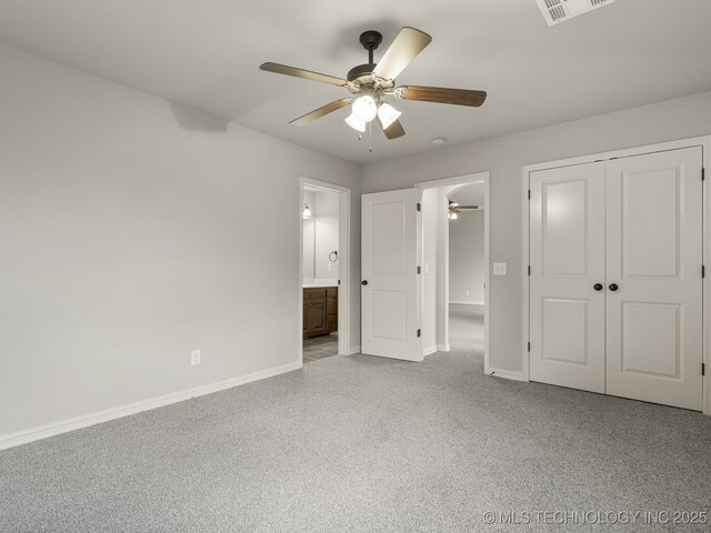 3712 W 107th Ct, Jenks, OK 74037 - unfurnished bedroom featuring carpet, a closet, a ceiling fan, and ensuite bath