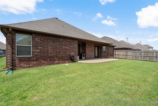3712 W 107th Ct, Jenks, OK 74037 - back of property featuring a patio area, brick siding, and a shingled roof