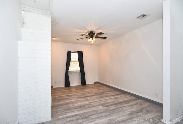 20529 E 4th St, Tulsa, OK 74108 - unfurnished room with ceiling fan and wood finished floors