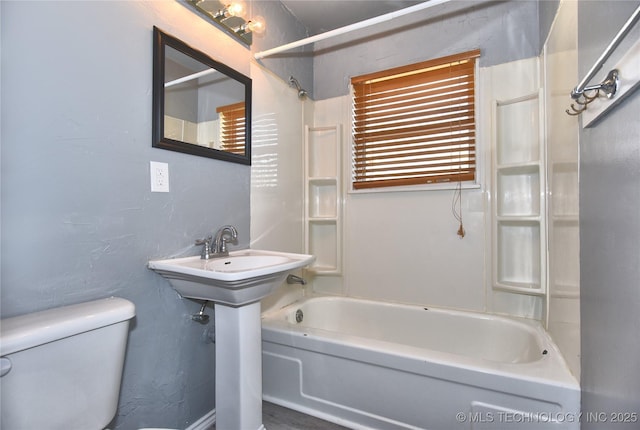 20529 E 4th St, Tulsa, OK 74108 - bathroom featuring bathtub / shower combination and toilet