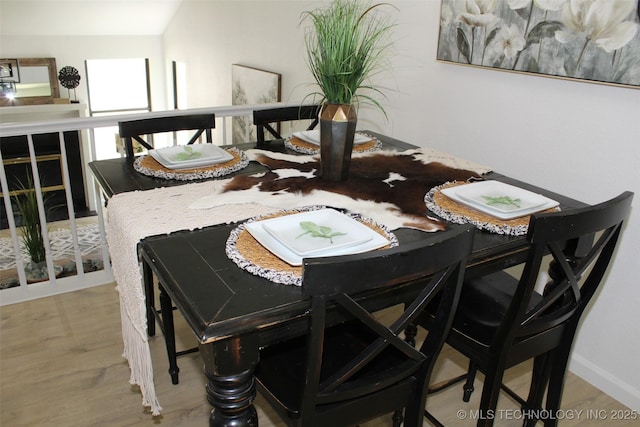 109 E 48th St, Sand Springs, OK 74063 - dining area with wood finished floors and baseboards