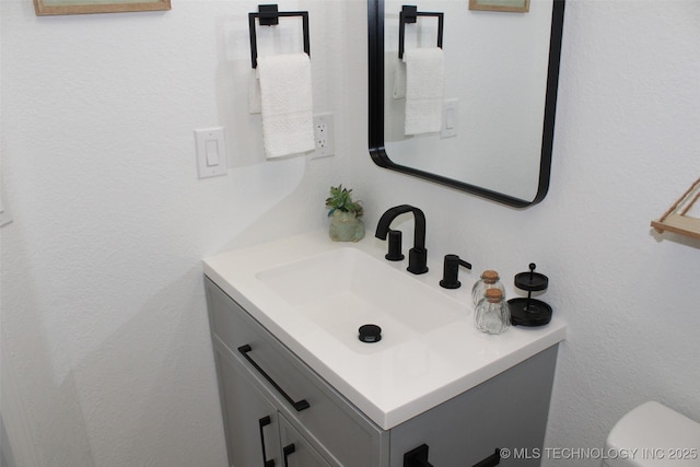 109 E 48th St, Sand Springs, OK 74063 - bathroom featuring vanity and toilet