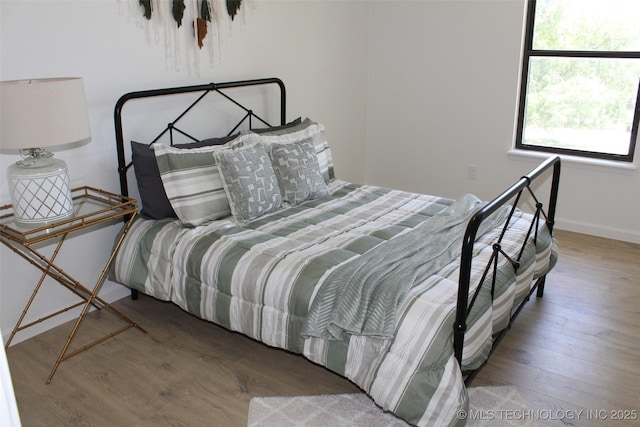 109 E 48th St, Sand Springs, OK 74063 - bedroom with wood finished floors