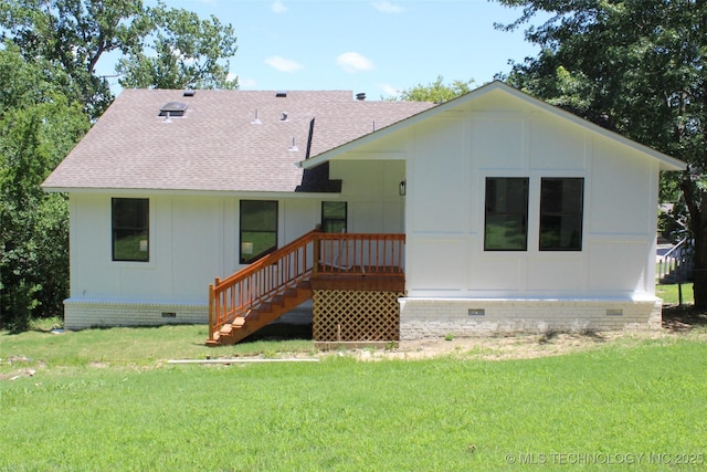 109 E 48th St, Sand Springs, OK 74063 - rear view of house with crawl space, roof with shingles, and a lawn