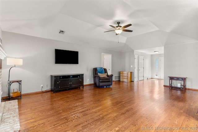 3220 N 3rd Pl, Broken Arrow, OK 74012 - living room with vaulted ceiling, ceiling fan, and wood finished floors