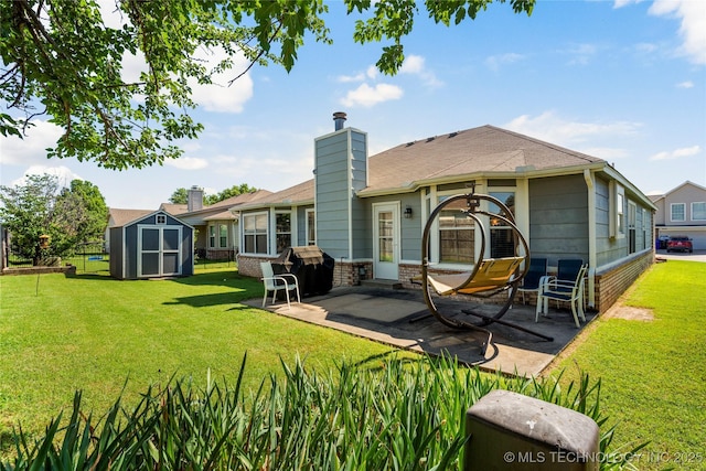 3220 N 3rd Pl, Broken Arrow, OK 74012 - back of house featuring a patio, a storage shed, and a chimney