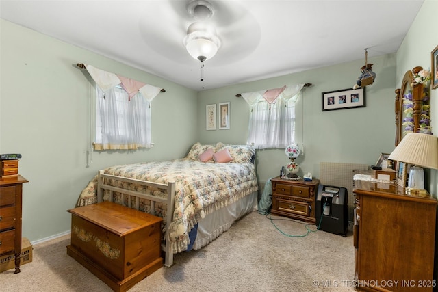 3811 Broadway Ct, Ada, OK 74820 - bedroom featuring multiple windows, carpet flooring, and a ceiling fan