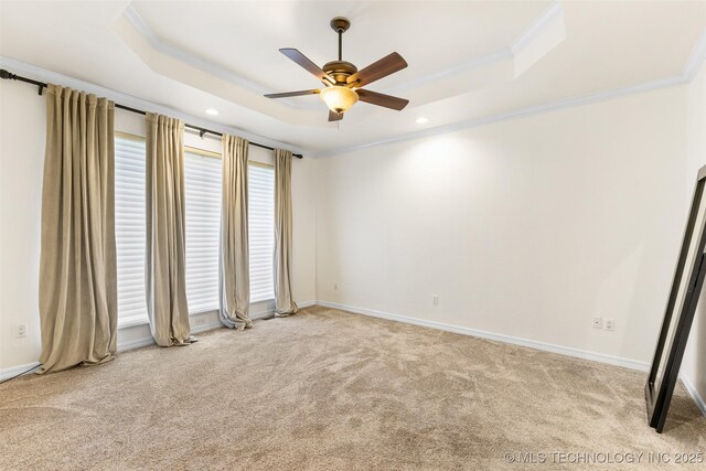 1505 Augusta, Ada, OK 74820 - unfurnished room with a tray ceiling, crown molding, light colored carpet, ceiling fan, and recessed lighting