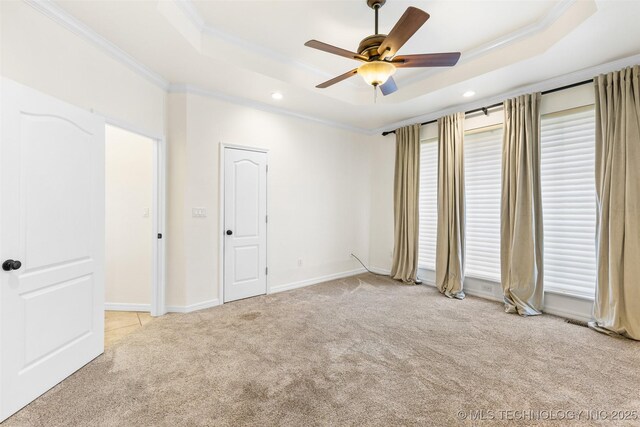 1505 Augusta, Ada, OK 74820 - unfurnished bedroom featuring a raised ceiling, carpet, crown molding, recessed lighting, and ceiling fan