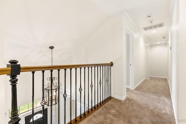 1505 Augusta, Ada, OK 74820 - corridor with carpet flooring, crown molding, and an upstairs landing