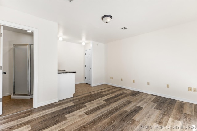 1505 Augusta, Ada, OK 74820 - empty room featuring wood finished floors