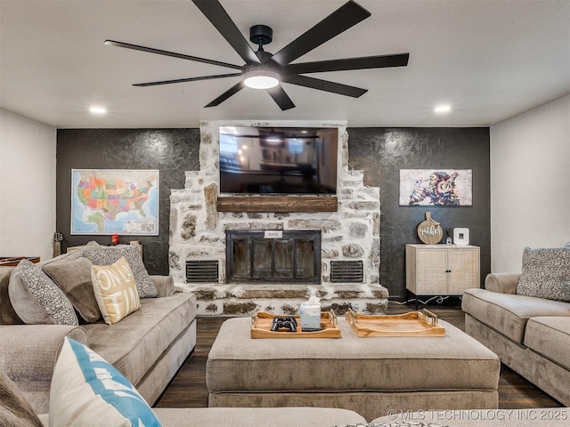 11 Port Duncan, Afton, OK 74331 - living area featuring dark wood finished floors, a ceiling fan, a fireplace, and recessed lighting