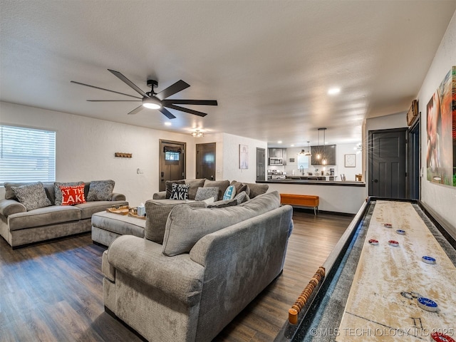 11 Port Duncan, Afton, OK 74331 - living room with dark wood-style flooring and a ceiling fan