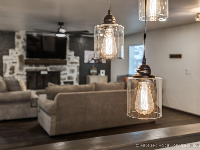 11 Port Duncan, Afton, OK 74331 - living area featuring wood finished floors and a fireplace