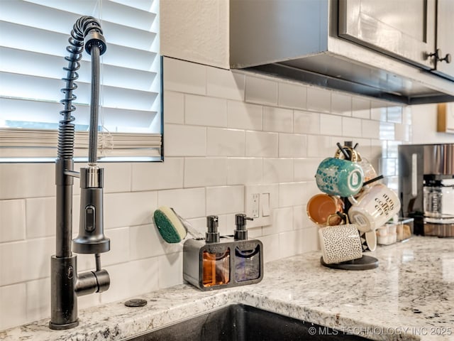 11 Port Duncan, Afton, OK 74331 - kitchen view of tasteful backsplash and light stone countertops
