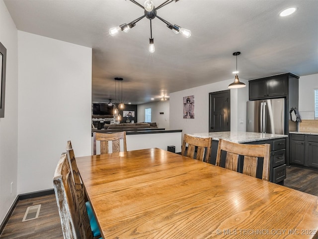 11 Port Duncan, Afton, OK 74331 - dining space featuring dark wood-style flooring, a chandelier, and recessed lighting