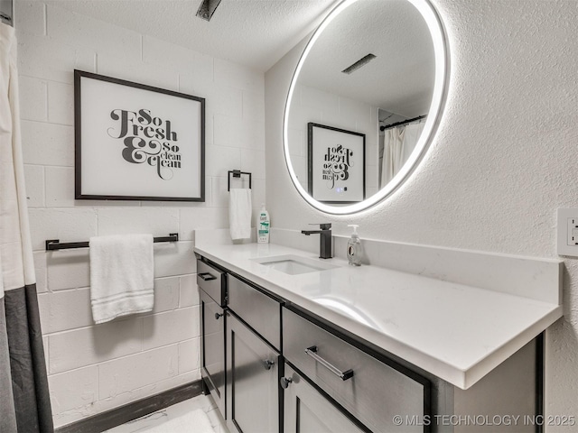 11 Port Duncan, Afton, OK 74331 - full bath with vanity and a textured ceiling