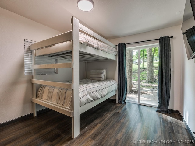 11 Port Duncan, Afton, OK 74331 - bedroom featuring access to exterior and wood finished floors