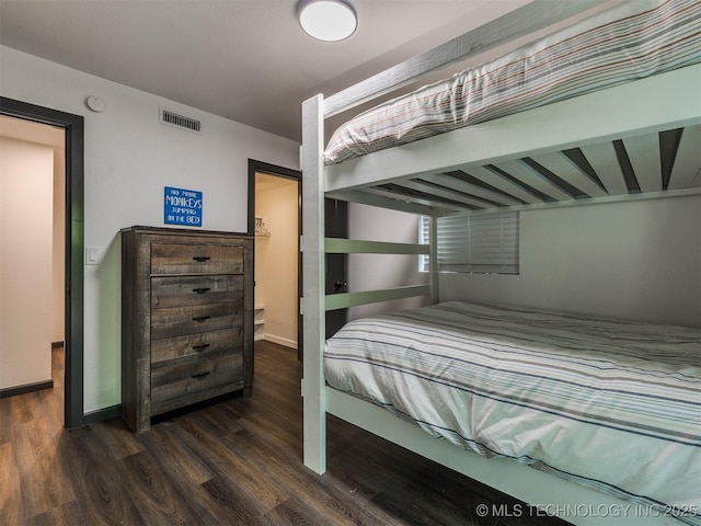 11 Port Duncan, Afton, OK 74331 - bedroom featuring dark wood-style flooring and baseboards