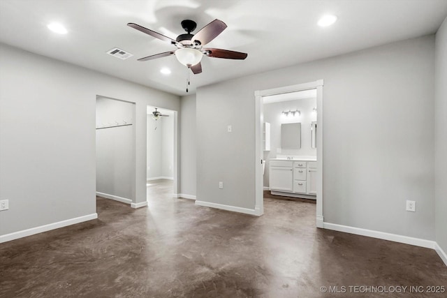 36619 W 141st St S, Bristow, OK 74010 - unfurnished bedroom featuring finished concrete flooring, recessed lighting, connected bathroom, and a ceiling fan