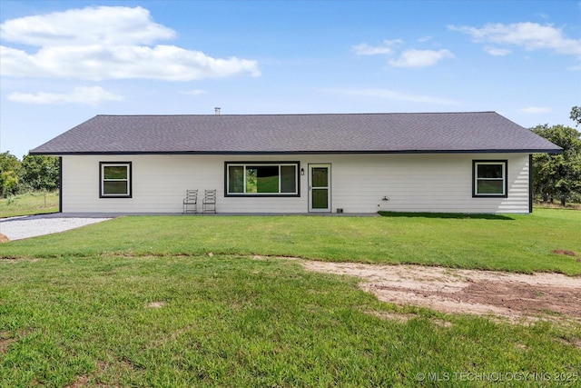 36619 W 141st St S, Bristow, OK 74010 - back of house with a yard and roof with shingles