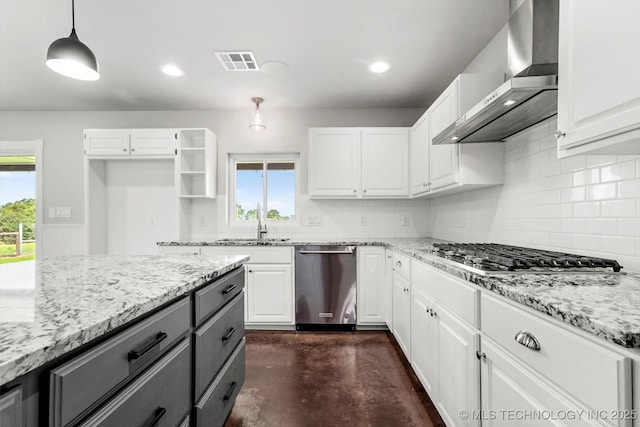 36619 W 141st St S, Bristow, OK 74010 - kitchen featuring wall chimney exhaust hood, stainless steel appliances, gray cabinets, tasteful backsplash, and concrete floors