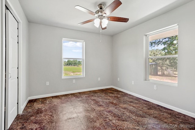 36619 W 141st St S, Bristow, OK 74010 - unfurnished bedroom featuring baseboards and a ceiling fan
