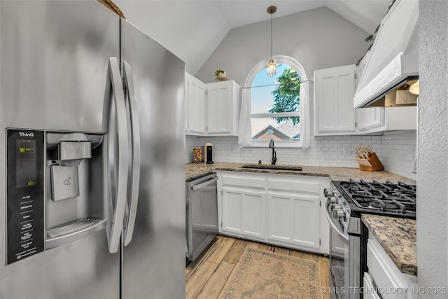 19912 E 36th St S, Broken Arrow, OK 74014 - kitchen with stainless steel appliances, exhaust hood, white cabinets, light stone countertops, and light wood-style flooring