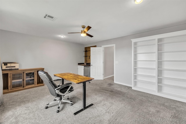 19912 E 36th St S, Broken Arrow, OK 74014 - carpeted office space featuring a ceiling fan and baseboards
