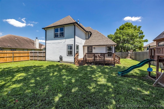 19912 E 36th St S, Broken Arrow, OK 74014 - back of property featuring a fenced backyard, roof with shingles, a wooden deck, and a playground
