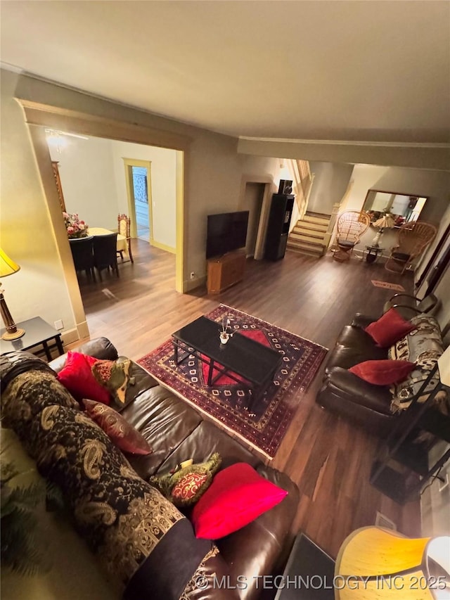 519 N 15th St, Muskogee, OK 74401 - living area featuring wood finished floors and stairway