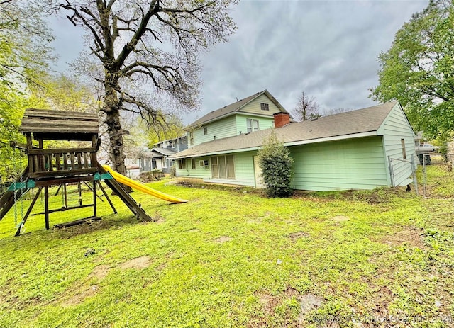 519 N 15th St, Muskogee, OK 74401 - view of green lawn with a playground