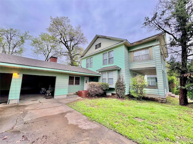 519 N 15th St, Muskogee, OK 74401 - view of front facade with a garage, concrete driveway, a front yard, and a chimney